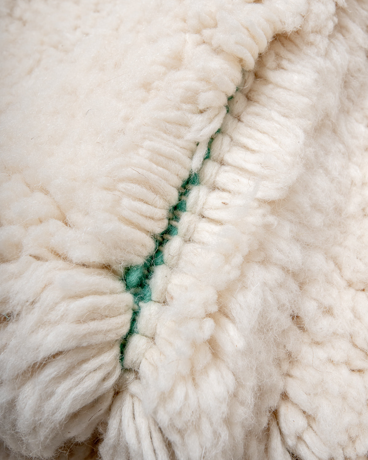 Modern, designer, handcrafted Berber rug from Morocco. Beniourain carpet with beautiful colours and patterns and fluffy wool texture.